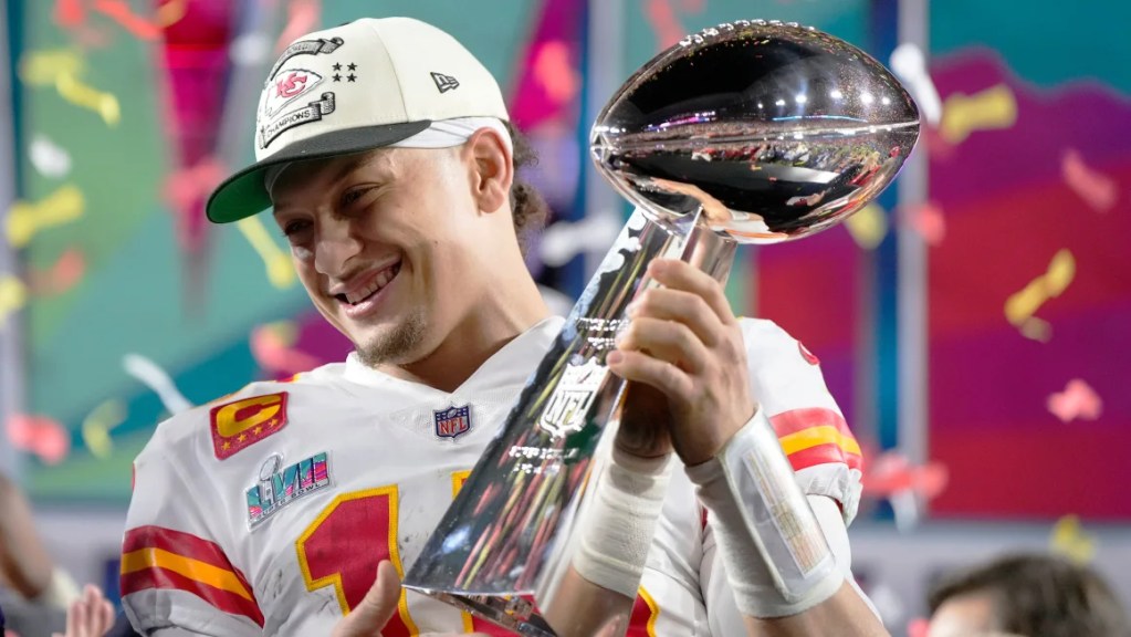 The Life and Career of Patrick Mahomes 4 Patrick Mahomes holding the Vince Lombardi trophy
