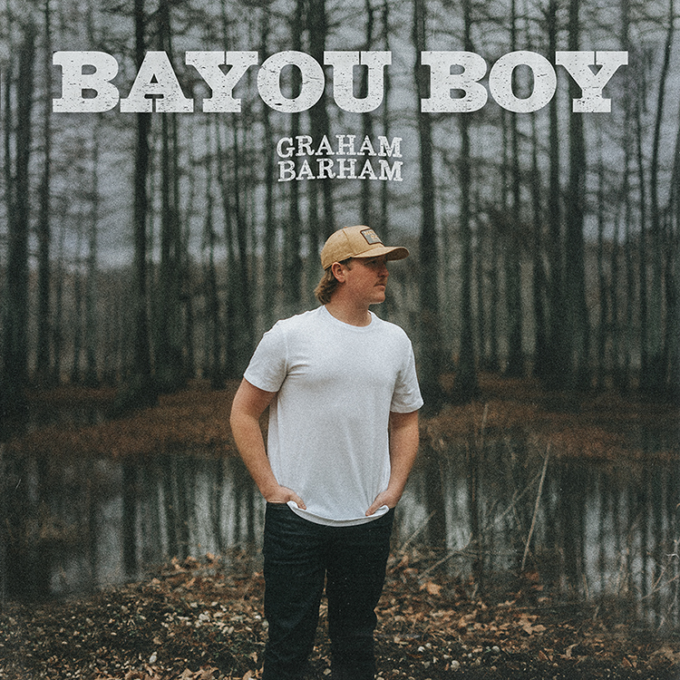 Graham Barham stands in the middle of the Louisiana bayou