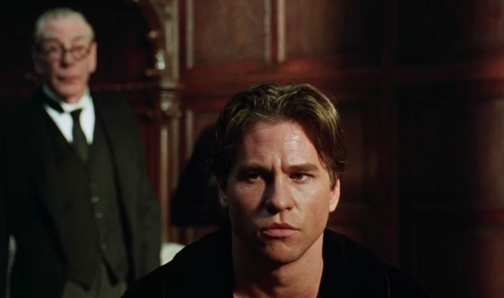 Val Kilmer Dead At 65: A Look Back at His Most Iconic Movie Roles 1 valkilmer batman bridge