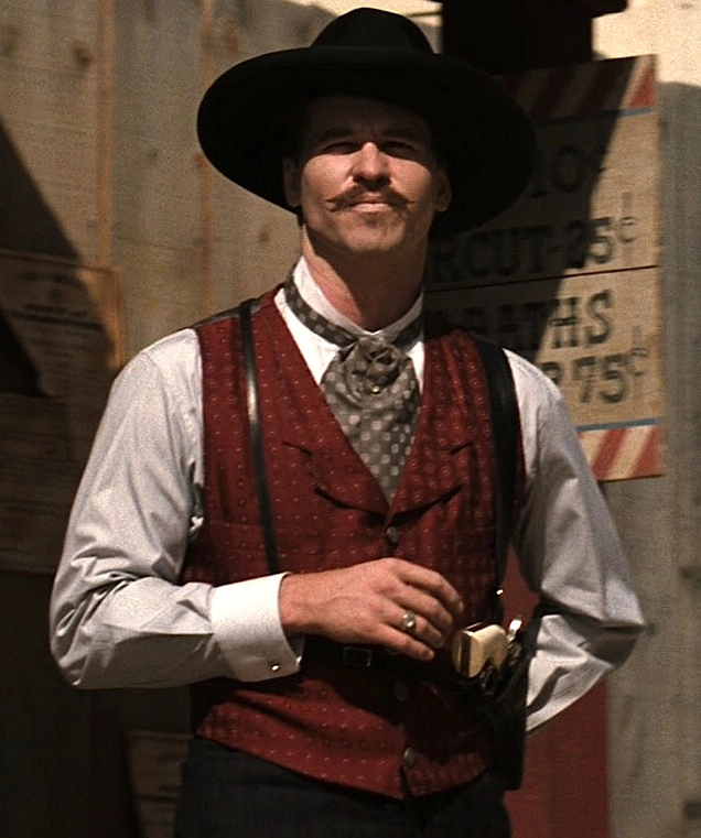 Val Kilmer Dead At 65: A Look Back at His Most Iconic Movie Roles 2 valkilmer tombstone bridge